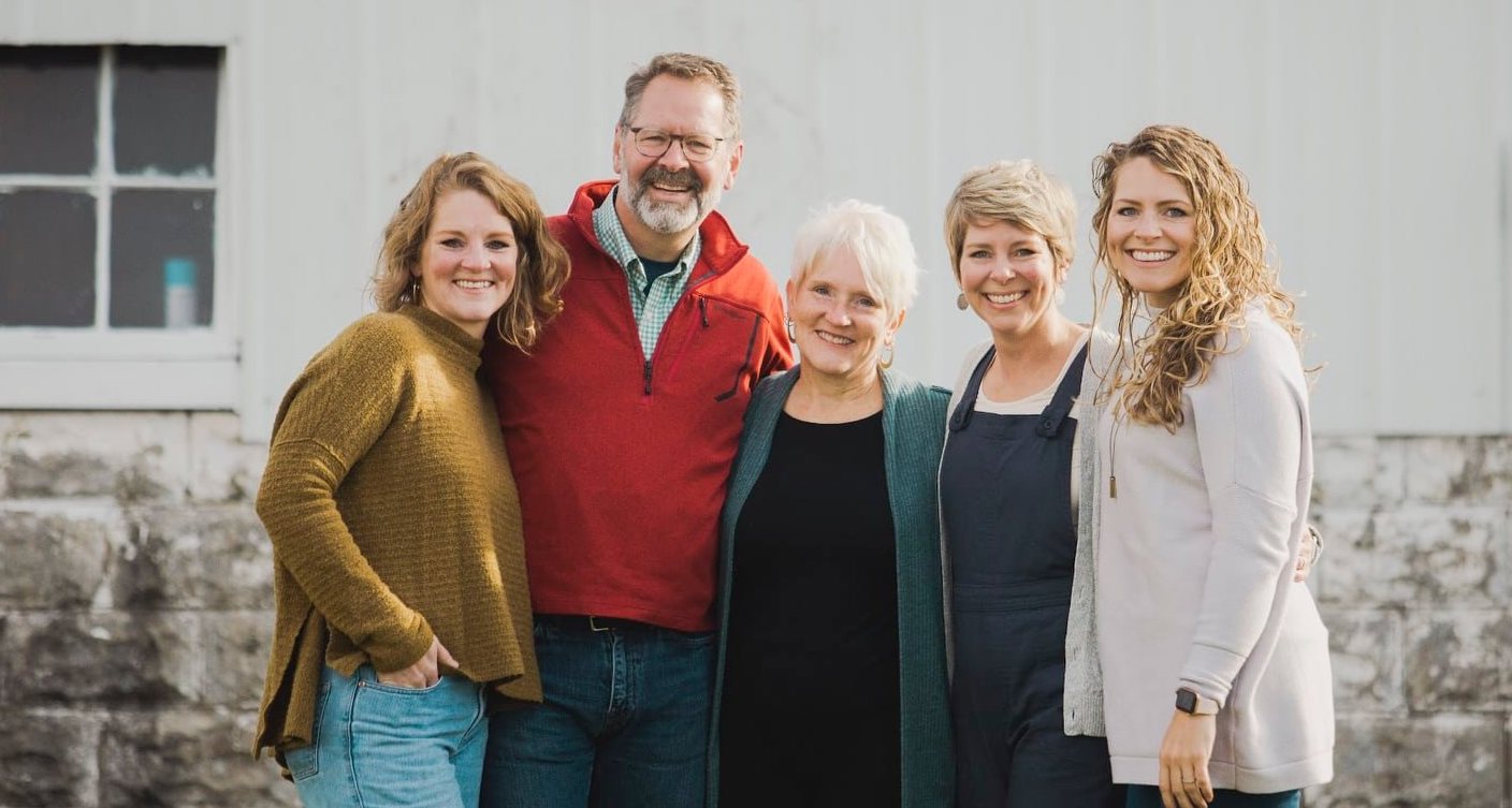 John and DeAnn Heck, with Lauren, Corrie, and Elise.